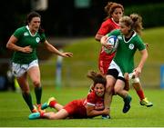 25 June 2016; Nicole Cronin of Ireland is tackled by Oumayma Dziri of Tunisia during the World Rugby Women's Sevens Olympic Repechage Quarter Final match between Ireland and Tunisia at UCD Sports Centre in Belfield, Dublin. Photo by Seb Daly/Sportsfile