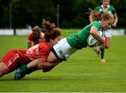25 June 2016; Nicole Cronin of Ireland scores her side's fourth try of the match during the World Rugby Women's Sevens Olympic Repechage Quarter Final match between Ireland and Tunisia at UCD Sports Centre in Belfield, Dublin. Photo by Seb Daly/Sportsfile