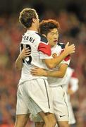 4 August 2010; Ji Sung Park, Manchester United, right, is congratulated by team-mate Johnny Evans after scoring his side's fifth goal. Friendly Match, Airtricity League XI v Manchester United, Aviva Stadium, Lansdowne Road, Dublin. Picture credit: Brendan Moran / SPORTSFILE
