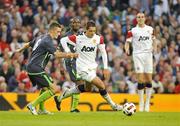 4 August 2010; Chicharito, Manchester United, in action against Shaun Williams, Airtricity League XI. Friendly Match, Airtricity League XI v Manchester United, Aviva Stadium, Lansdowne Road, Dublin. Photo by Sportsfile
