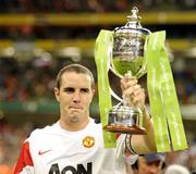 4 August 2010; Manchester United captain John O'Shea celebrates with the Airtricity Challange Trophy. Friendly Match, Airtricity League XI v Manchester United, Aviva Stadium, Lansdowne Road, Dublin. Picture credit: David Maher / SPORTSFILE