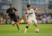 4 August 2010; Ji-Sung Park, Manchester United, in action against Shaun Williams, Airtricity League XI. Friendly Match, Airtricity League XI v Manchester United, Aviva Stadium, Lansdowne Road, Dublin. Picture credit: Stephen McCarthy / SPORTSFILE