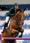 6 August 2010; Denis Lynch, competing on Nabab's Son, Ireland, during the Meydan FEI Nations Cup - Failte Ireland Dublin Horse Show 2010. RDS, Ballsbridge, Dublin. Picture credit: Stephen McCarthy / SPORTSFILE