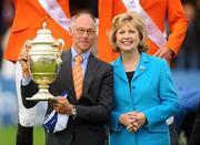 6 August 2010; Netherlands Chef d'Equipe Rob Ehrens is presented with the Aga Khan trophy by President of Ireland Mary McAleese during the Meydan FEI Nations Cup - Failte Ireland Dublin Horse Show 2010. RDS, Ballsbridge, Dublin. Picture credit: Stephen McCarthy / SPORTSFILE