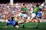 6 July 1991; Ciaran Walsh of Dublin in action against Colm Coyle, centre, and Mick Lyons of Meath during the Leinster Senior Football Championship preliminary round third replay match between Dublin and Meath at Croke Park in Dublin. Photo by David Maher/Sportsfile