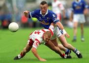 8 July 2001; Rory Donohoe of Cavan in action against Owen Mulligan of Tyrone during the Bank of Ireland Ulster Senior Football Championship Final match between Tyrone and Cavan at St Tiernach's Park in Clones, Monaghan. Photo by Damien Eagers/Sportsfile
