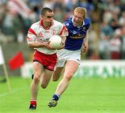 8 July 2001; Ryan McMenamin of Tyrone in action against Dermot McCabe of Cavan during the Bank of Ireland Ulster Senior Football Championship Final match between Tyrone and Cavan at St Tiernach's Park in Clones, Monaghan. Photo by David Maher/Sportsfile