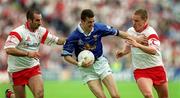 8 July 2001; Thomas Prior of Cavan in action against Declan McCrossan, left, and Sean Teague of Tyrone during the Bank of Ireland Ulster Senior Football Championship Final match between Tyrone and Cavan at St Tiernach's Park in Clones, Monaghan. Photo by Damien Eagers/Sportsfile