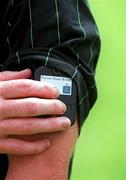 8 July 2001; The referee adjusts his paging system, used by linesmen to attract his attention, prior to the Ulster Minor Football Championship Final match between Tyrone and Monaghan at St Tiernach's Park in Clones, Monaghan. Photo by David Maher/Sportsfile
