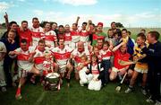 15 July 2001; The Derry team celebrate with the cup after the Guinness Ulster Senior Hurling Championship Final match between Derry and Down at Casement Park in Belfast. Photo by Aoife Rice/Sportsfile