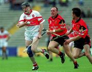 15 July 2001; Seamus Downey of Derry in action against Gary Savage, centre, and Martin Coulter Snr of Down during the Guinness Ulster Senior Hurling Championship Final match between Derry and Down at Casement Park in Belfast. Photo by Aoife Rice/Sportsfile