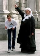 19 July 2001; 1998 London Marathon Champion Catherina McKiernan is put under starters orders by &quot;Judge Moriarty&quot;  at the launch of the adidas Dublin Marathon Runner's Diary outside the Four Courts in Dublin. Photo by Brendan Moran/Sportsfile