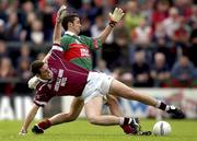 21 July 2001; Noel Connelly of Mayo in action against Fergal Wilson of Westmeath during the Bank of Ireland All-Ireland Senior Football Championship Qualifier Round 4 match between Mayo and Westmeath at Dr. Hyde Park in Roscommon. Photo by Damien Eagers/Sportsfile