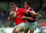 22 July 2001; John Miskella of Cork in action against Alan Kerins of Galway during the Bank of Ireland All-Ireland Senior Football Championship Qualifier Round 4 match between Galway and Cork at Croke Park in Dublin. Photo by Brian Lawless/Sportsfile