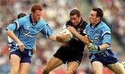 22 July 2001; Eamonn O'Hara of Sligo is tackled by Peadar Andrews, left, and Paddy Christie of Dublin during the Bank of Ireland All-Ireland Senior Football Championship Qualifier Round 4 match between Dublin and Sligo at Croke Park in Dublin. Photo by Brendan Moran/Sportsfile