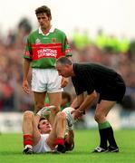21 July 2001; Referee Niall Barrett takes the ball from Maurice Sheridan of Mayo during the Bank of Ireland All-Ireland Senior Football Championship Qualifier Round 4 match between Mayo and Westmeath at Dr. Hyde Park in Roscommon. Photo by Damien Eagers/Sportsfile