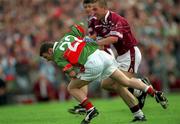 21 July 2001; David Nestor of Mayo is tackled by John Keane of Westmeath during the Bank of Ireland All-Ireland Senior Football Championship Qualifier Round 4 match between Mayo and Westmeath at Dr. Hyde Park in Roscommon. Photo by Damien Eagers/Sportsfile