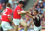 22 July 2001; Mark O'Sullivan of Cork in action against Gary Fahey of Galway during the Bank of Ireland All-Ireland Senior Football Championship Qualifier Round 4 match between Galway and Cork at Croke Park in Dublin. Photo by Ray McManus/Sportsfile