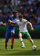 26 June 2016; Wes Hoolahan of Republic of Ireland shields possession against Kingsley Coman of France during the UEFA Euro 2016 Round of 16 match between France and Republic of Ireland at Stade des Lumieres in Lyon, France. Photo by Stephen McCarthy/Sportsfile