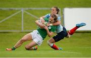 26 June 2016; Aoife Doyle of Ireland scores her side's first try of the match under pressure from Iulia Guzeva of Russia during the World Rugby Women's Sevens Olympic Repechage Semi Final match between Russia and Ireland at UCD Sports Centre in Belfield, Dublin. Photo by Seb Daly/Sportsfile