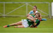 26 June 2016; Aoife Doyle of Ireland scores her side's first try of the match under ressure from Iulia Guzeva of Russia during the World Rugby Women's Sevens Olympic Repechage Semi Final match between Russia and Ireland at UCD Sports Centre in Belfield, Dublin. Photo by Seb Daly/Sportsfile