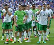 26 June 2016; Robbie Keane, centre with Stephen Ward, left and Seamus Coleman of Republic of Ireland at the end of the UEFA Euro 2016 Round of 16 match between France and Republic of Ireland at Stade des Lumieres in Lyon, France. Photo by David Maher/Sportsfile