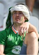 26 June 2016; A Republic of Ireland supporter looking dejected after defeat to France in the UEFA Euro 2016 Round of 16 match between France and Republic of Ireland at Stade des Lumieres in Lyon, France. Photo by Stephen McCarthy/Sportsfile