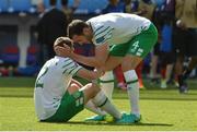 26 June 2016; John O'Shea consoles team-mate Seamus Coleman of Republic of Ireland after defeat to France in the UEFA Euro 2016 Round of 16 match between France and Republic of Ireland at Stade des Lumieres in Lyon, France. Photo by David Maher/Sportsfile