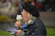 26 June 2016; A racegoer enjoys her ice cream at the Curragh Racecourse in the Curragh, Co. Kildare. Photo by Cody Glenn/Sportsfile