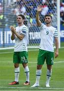 26 June 2016; Robbie Brady left, and Shane Long of Republic of Ireland salute the fans after defeat in the UEFA Euro 2016 Round of 16 match between France and Republic of Ireland at Stade des Lumieres in Lyon, France. Photo by Ray McManus/Sportsfile