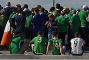 26 June 2016 Republic of Ireland supporters relax as they wait for the r=tram to the city centre after the UEFA Euro 2016 Round of 16 match between France and Republic of Ireland at Stade des Lumieres in Lyon, France. Photo by Ray McManus/Sportsfile
