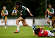 26 June 2016; Larissa Marino-Anderson of Cook Islands is tackled by the shorts by Natasha Olson-Thorne of Hong Kong during the World Rugby Women's Sevens Olympic Repechage Trophy Final match between Cook Islands and Hong Kong at UCD Sports Centre in Belfield, Dublin. Photo by Seb Daly/Sportsfile