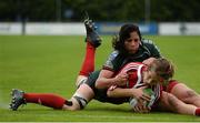 26 June 2016; Sara Jessica Silva of Portugal is tackled by Michelle Farah of Mexico as she scores a try during the World Rugby Women's Sevens Olympic Repechage Trophy Quarter Final match between Portugal and Mexico at UCD Sports Centre in Belfield, Dublin. Photo by Seb Daly/Sportsfile