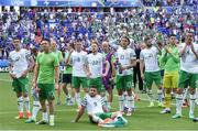 26 June 2016; Shane Long of Republic of Ireland seated, surrounded by his team mates after defeat to France in the UEFA Euro 2016 Round of 16 match between France and Republic of Ireland at Stade des Lumieres in Lyon, France. Photo by David Maher/Sportsfile
