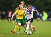 26 June 2016; Amy Coyne of Midlands Schoolgirls League in action against Niamh McDevitt of Donegal Women's League during their FAI U16 Gaynor Cup Plate Final at University of Limerick in Limerick. Photo by Diarmuid Greene/Sportsfile
