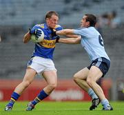 10 July 2010; Peter Acheson, Tipperary, in action against Ger Brennan, Dublin. GAA Football All-Ireland Senior Championship Qualifier, Round 2, Dublin v Tipperary, Croke Park, Dublin. Picture credit: Ray McManus / SPORTSFILE