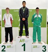 7 August 2010; Josh Walker, Scotland, stands on the top step of the podium alongside Ryhs Williams, left, Wales and Eoin Power, Athletics Ireland, after winning the U-18 Mens 100m Hurdles. Celtic Games Track and Field, Athlone 2010, Athlone Institute of Technology, Athlone, Co. Westmeath. Picture credit: Barry Cregg / SPORTSFILE