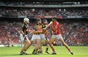 8 August 2010; Aisake Ó hAilpín, Cork, squares up to Kilkenny players, from left, PJ Ryan, Jackie Tyrrell and Noel Hickey during the opening minute of the game. GAA Hurling All-Ireland Senior Championship Semi-Final, Kilkenny v Cork, Croke Park, Dublin. Picture credit: Stephen McCarthy / SPORTSFILE