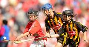 8 August 2010; Caolan Smith, Scoil Phádraig Clane, Co. Kildare, representing Cork, in action against Jack Hennessy, St. John's Snr. School, Co. Kilkenny, right, and Shane Whelan, St. Paul's N.S., Portlaoise, Co. Laois, representing Kilkenny. GAA Into Mini-Sevens during half time of the GAA Hurling All-Ireland Senior Championship Semi-Final, Kilkenny v Cork, Croke Park, Dublin. Picture credit: Stephen McCarthy / SPORTSFILE