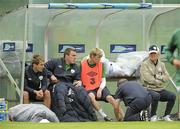 9 August 2010; Republic of Ireland players, from left to right, Kevin Doyle, Richard Dunne, who both sat out squad training, alongside Andy Keogh receiving medical attention from team doctor Alan Byrne, as manager Giovanni Trapattoni watches squad training ahead of their international friendly against Argentina on Wednesday. Republic of Ireland squad training, Gannon Park, Malahide, Dublin. Picture credit: David Maher / SPORTSFILE