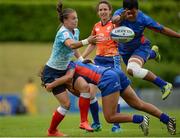 25 June 2016; Iulia Guzeva of Russia is tackled by Keilamarita Pouri-Lane, centre, of Samoa, and has her pass blocked by Apaula Kerisiano Enesi, right, during the World Rugby Women's Sevens Olympic Repechage Pool A match between Russia and Samoa at UCD Sports Centre in Belfield, Dublin. Photo by Seb Daly/Sportsfile