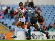 25 June 2016; Claudia Rasoarimalala of Madagascar is tackled by Caroline Malenga of Zimbabwe on her way to scoring her side's second try of the match during the World Rugby Women's Sevens Olympic Repechage Pool A match between Zimbabwe and Madagascar at UCD Sports Centre in Belfield, Dublin. Photo by Seb Daly/Sportsfile