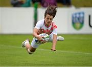 25 June 2016; Amal Dardouri of Tunisia scores a try during the World Rugby Women's Sevens Olympic Repechage Pool B match between Mexico and Tunisia at UCD Sports Centre in Belfield, Dublin. Photo by Seb Daly/Sportsfile