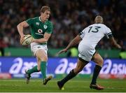 25 June 2016; Andrew Trimble of Ireland in action against Lionel Mapoe of South Africa during the Castle Lager Incoming Series 3rd Test between South Africa and Ireland at the Nelson Mandela Bay Stadium in Port Elizabeth, South Africa. Photo by Brendan Moran/Sportsfile