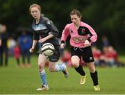 26 June 2016; Kate McPhilips of Mid Western Girls League in action against Niamh Flannery of Mayo Youth League during their FAI U16 Gaynor Cup 3rd/4th place playoff at University of Limerick in Limerick. Photo by Diarmuid Greene/Sportsfile