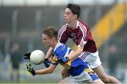 26 June 2016; Ben Harding, Castleknock, Dublin, in action against Aaron Gallagher, Termon, Co. Donegal, during the John West Féile Peile na nÓg Division 1 Final at Austin Stack Park in Tralee, Co Kerry.  Photo by Matt Browne/Sportsfile