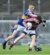 26 June 2016; Conor Black, Termon, Co. Donegal, in action against Fionn Gibbons, Castleknock, Dublin, during the John West Féile Peile na nÓg Division 1 Final at Austin Stack Park in Tralee, Co Kerry.  Photo by Matt Browne/Sportsfile