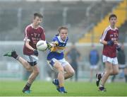 26 June 2016; Aaron Reid, Termon, Co. Donegal, in action against Ben Harding, Castleknock, Dublin,  during the John West Féile Peile na nÓg Division 1 Final at Austin Stack Park in Tralee, Co Kerry.  Photo by Matt Browne/Sportsfile