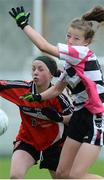 26 June 2016; Sally Murphy, Kilcullen, Co. Kildare in action against Amy Galligan, Killygarry, Co. Cavan during the John West Féile Peile na nÓg Division 2 Girls Final at Austin Stack Park in Tralee, Co Kerry.  Photo by Matt Browne/Sportsfile