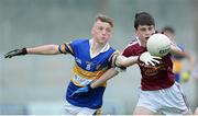 26 June 2016; Stephen Black, Termon, Co. Donegal, in action against Fionn Gibbons, Castleknock, Dublin, during the John West Féile Peile na nÓg Division 1 Final at Austin Stack Park in Tralee, Co Kerry.  Photo by Matt Browne/Sportsfile